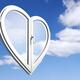 Heart-shaped window over blue sky... (thumbnail)