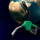 Gas pump nozzle connected to Earth non-renewable resources concept... (thumbnail)