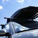 Car with roof rack luggage box... (thumbnail)