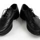 Pair of mens black leather dress shoes... (thumbnail)