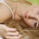 Romantic beauty portrait of young woman lying down... (thumbnail)
