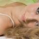Young Woman Lying Down Beauty Portrait... (thumbnail)