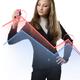 Young woman student of economics analyzing a financial chart... (thumbnail)