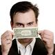 Man Staring at One Dollar Bill in His Hands... (thumbnail)
