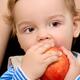 Baby boy eating apple... (thumbnail)