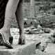 Woman legs in high heels at Greek temple ruins... (thumbnail)