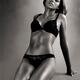 Young woman wearing black lingerie... (thumbnail)