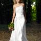 Beautiful Bride in Wedding Dress Walking Through the Woods... (thumbnail)