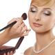 Young woman bride having makeup applied... (thumbnail)