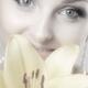 Beautiful Young Smiling Woman with Yellow Lily... (thumbnail)
