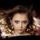 Teenage girl face with artistic makeup and flying hair... (thumbnail)