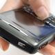 Hand holding BlackBerry 8310 Curve Smartphone... (thumbnail)