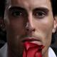 Fasce of a Man with a Red Rose... (thumbnail)