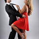 Young Woman Flirting with a Man pulling him by the tie... (thumbnail)