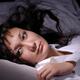 Woman Lying in Bed... (thumbnail)
