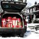 Car with open trunk full of gift boxes Christmas presents... (thumbnail)
