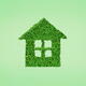 Green home conceptual symbol of a house made from green leaves... (thumbnail)