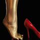 Woman Golden Legs and Red High Heel Shoes... (thumbnail)