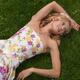 Young Woman Lying on Grass... (thumbnail)