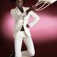 Woman Wearing White Suit... (thumbnail)