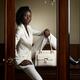 Woman Wearing White Suit... (thumbnail)