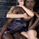 Two beautiful young women, african and caucasian, black and white, sit... (thumbnail)