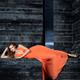 Young Woman in Long Orange Dress... (thumbnail)