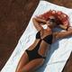Woman Sunbathing... (thumbnail)