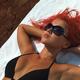 Woman Sunbathing... (thumbnail)