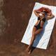 Woman Sunbathing... (thumbnail)