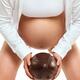 Pregnant Young Woman with a Football... (thumbnail)