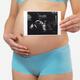 Preganant Woman Holding Ultrasound Image of Her Baby... (thumbnail)