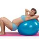Pregnant Young Woman Doing Pilates Workout... (thumbnail)