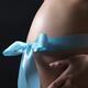 Pregnant Woman with a Bow on Her Belly... (thumbnail)