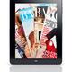 Apple iPad Tablet with Magazine Cover on Display... (thumbnail)