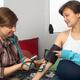 Midwife Measuring Pregnant Woman's Blood Pressure... (thumbnail)