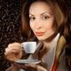 Young Beautiful Woman with a Cup of Coffee... (thumbnail)