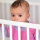 Baby Girl in a Crib... (thumbnail)