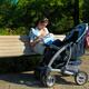 Young Woman Nursing Her Baby Outdoors... (thumbnail)