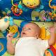 Baby Boy Lying on a Play Mat... (thumbnail)