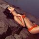 Beautiful Young Woman in Orange Bikini... (thumbnail)