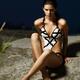 Beautiful Young Woman in White Swimsuit... (thumbnail)