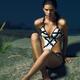 Beautiful Young Woman in White Swimsuit... (thumbnail)