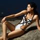 Beautiful Young Woman in White Swimsuit... (thumbnail)