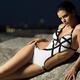 Beautiful Young Woman in White Monokini... (thumbnail)