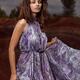 Young Woman Wearing Long Flare Dress... (thumbnail)