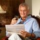 Senior Reading a Newspaper... (thumbnail)