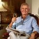 Senior Sitting in a Chair with a Glass of Wine... (thumbnail)