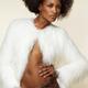Fashion Model Wearing a White Fur Jacket... (thumbnail)