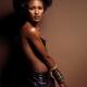 Beautiful Young Woman on Brown Background... (thumbnail)